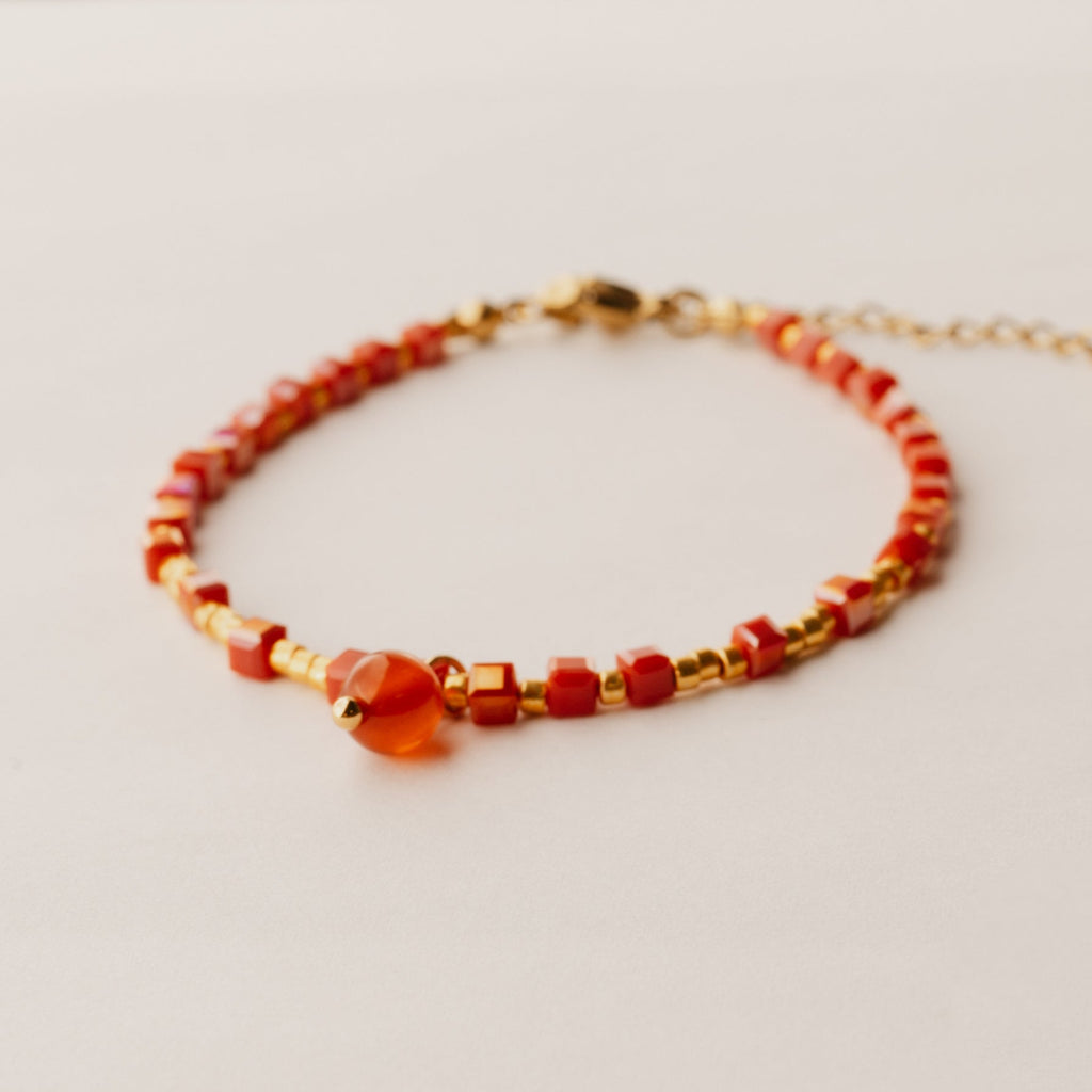 Red square glass beaded bracelet with red agate charm